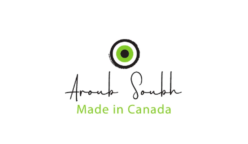 The back of a card: the eye mark, the signature Aroub Soubh and the words Made in Canada.